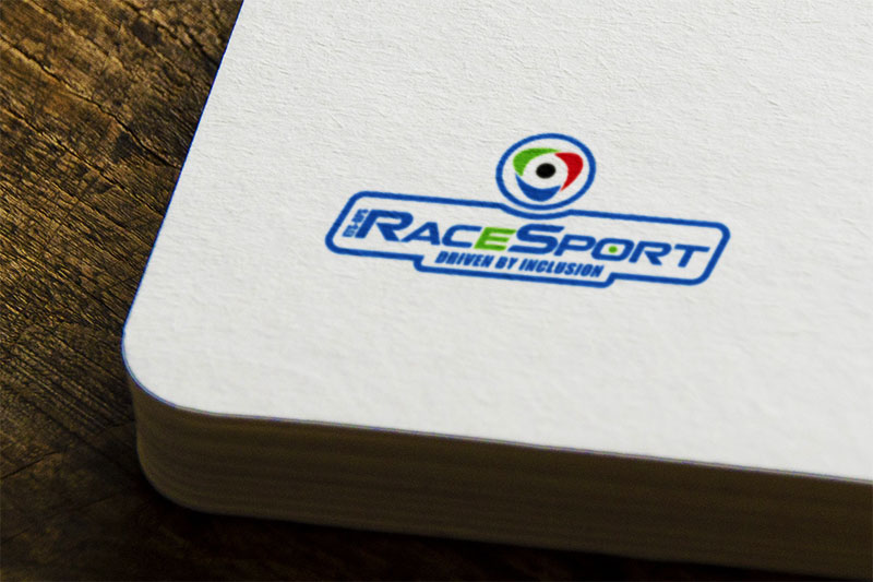 Il logo Racesport con il motto Driven by inclusion